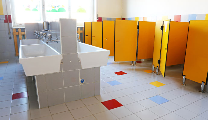 Clean restroom of daycare center