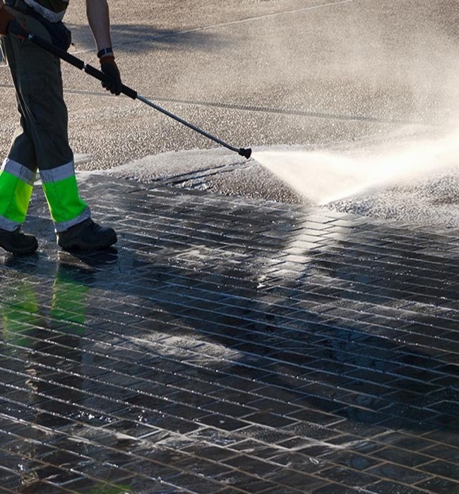Parking lot pressure washing