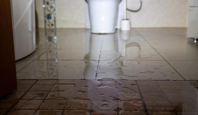 Water damage floor by bathroom sink leakage