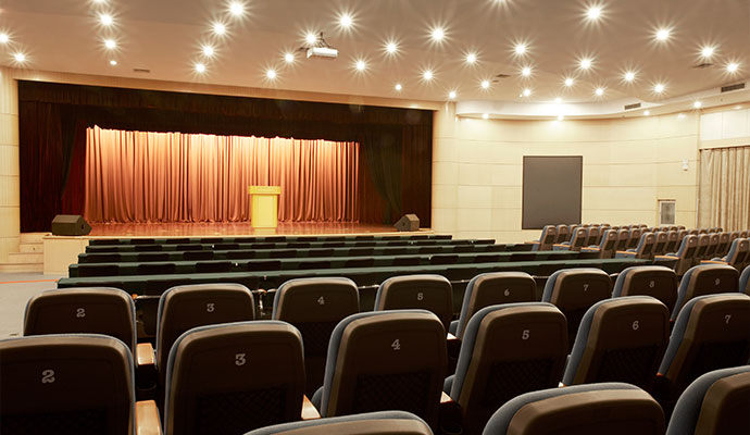 Empty auditorium hall with stage and seating