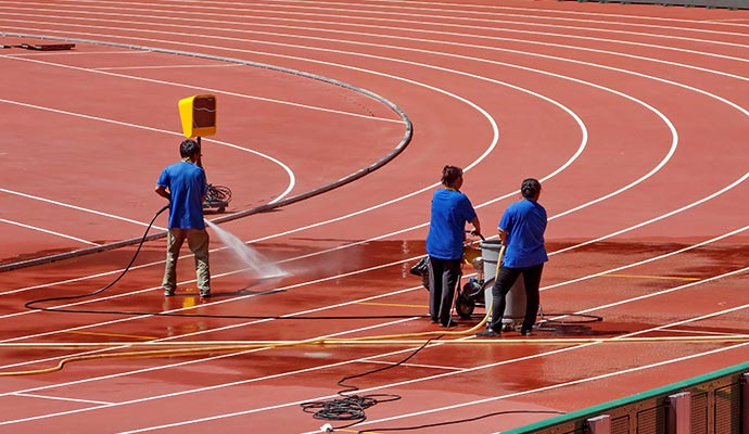 Cleaning running track professionally