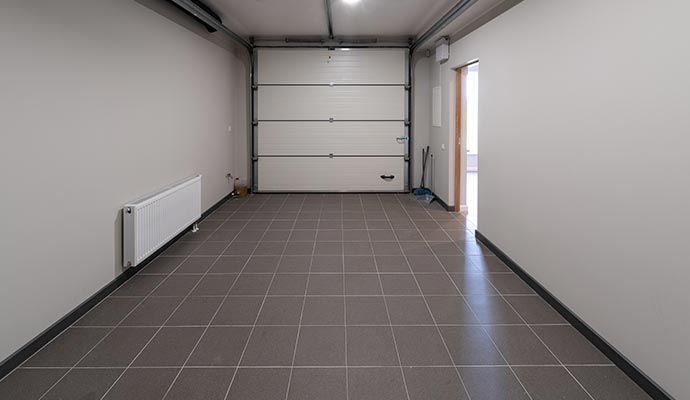 Modern garage with clean tile floor Modern garage with clean tile floor