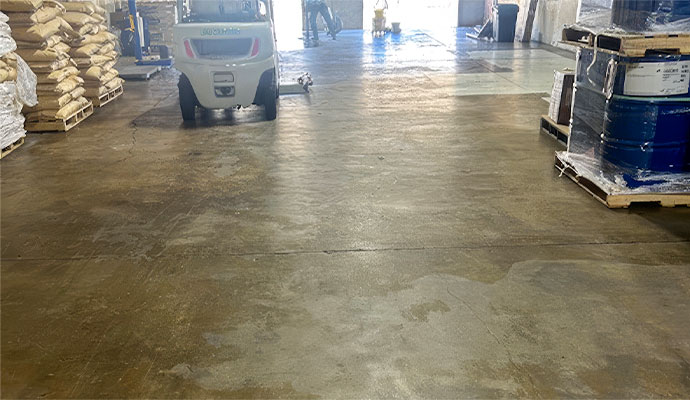 Industrial warehouse concrete floor cleaning maintenance