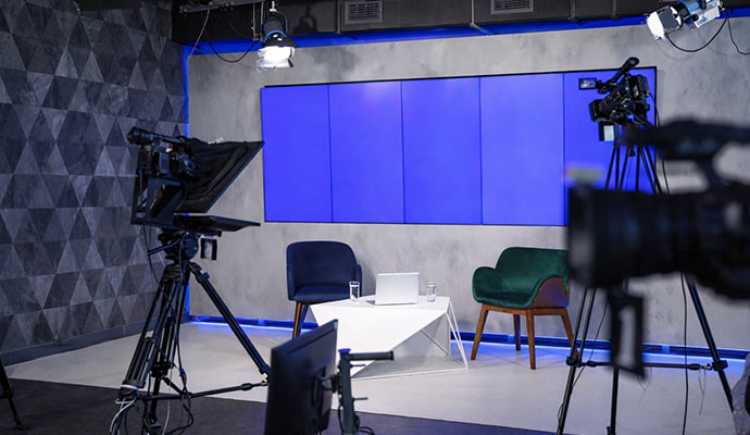Clean modern television talk show studio set.