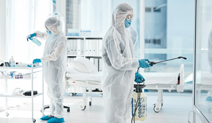 Cleaning a medical ward with professional equipment.