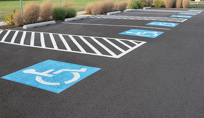 Clean parking lot with pavement and parking markings