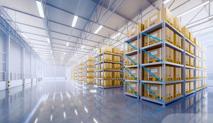 Large warehouse facility with storage racks and clean concrete flooring