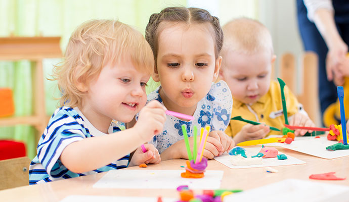 Kids are playing in a daycare center