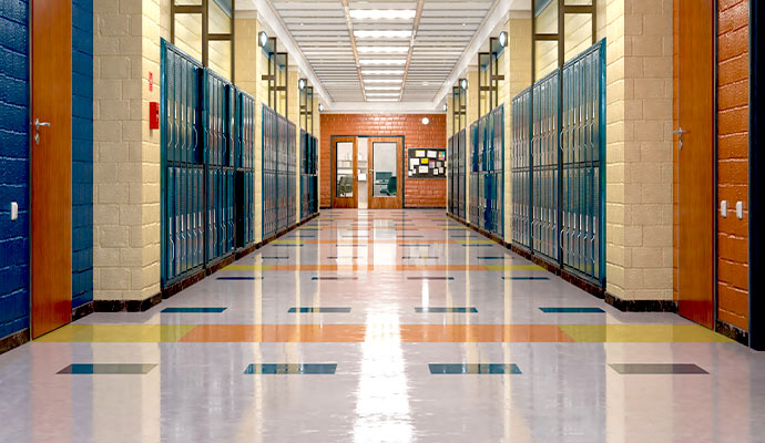Clean polished VCT floor in a school corridor